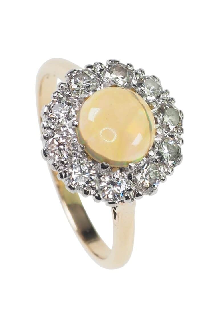 Art Déco Verlobungsring mit Opal und Diamanten aus 18 Karat Gold und Platin