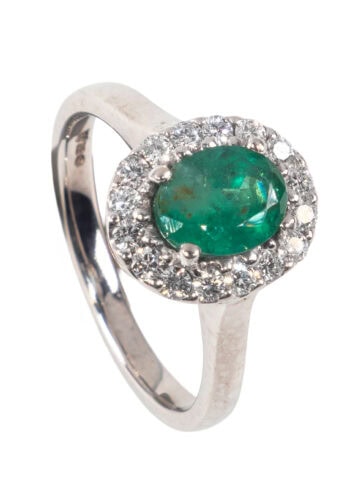 Um 1980 – Entourage Ring mit Smaragd und Diamanten