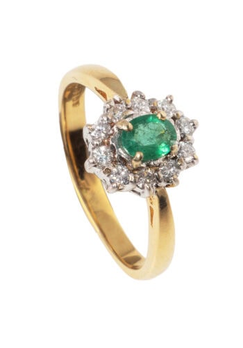 Um 1950 – Entourage Ring mit Smaragd und Diamanten