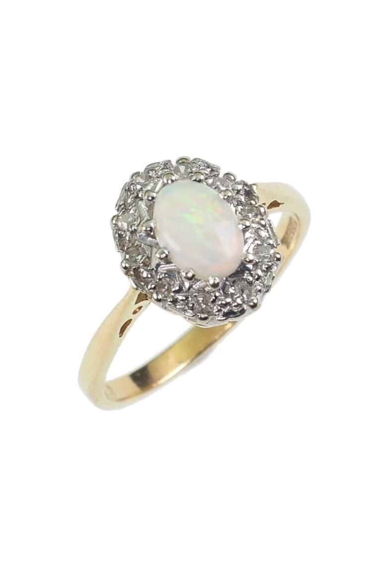 Vintage Verlobungsring mit Opal und Diamanten aus 18 Karat Gold und Platin