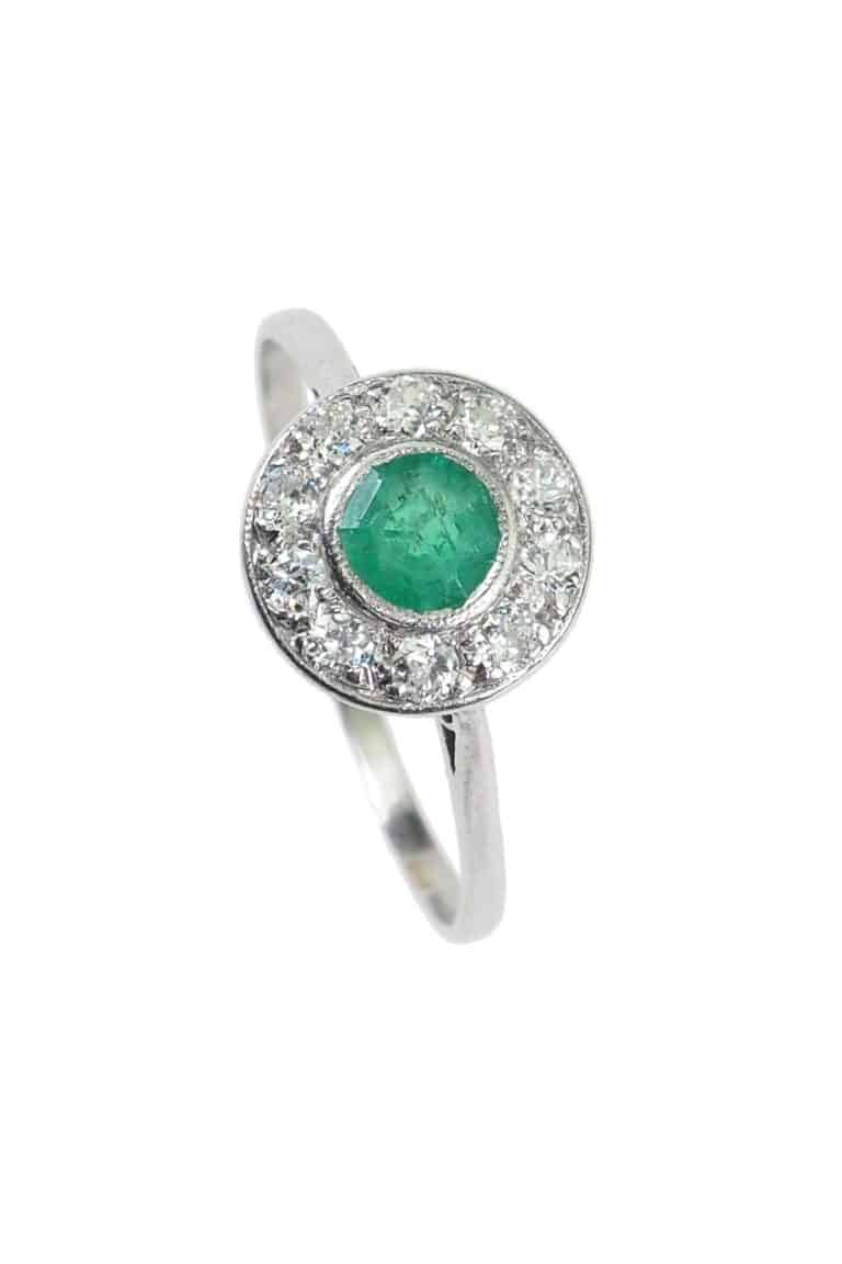 Art déco Verlobungsring mit Smaragd und Diamanten aus Platin